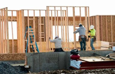 workers-working-framing-house-398986233 workers-working-framing-house-398986233